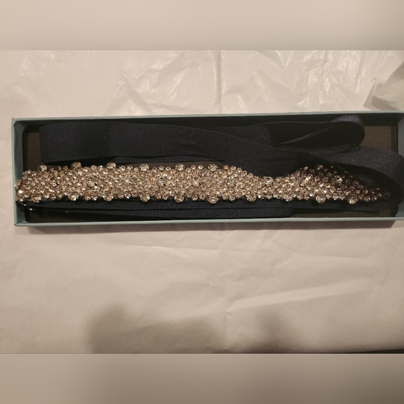 Sweet & V Accessories - Woman's rhinestone belt with blue ribbon.